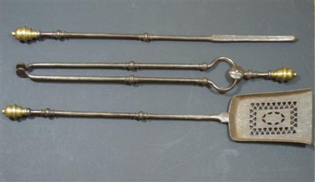 Appraisal: A group of three Georgian brass mounted fire irons comprising