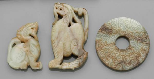 Appraisal: Three archaistic jade plaques Including two fabulous beasts rendered in