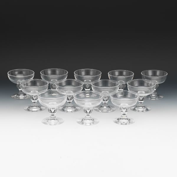 Appraisal: TWELVE STEUBEN FREDERICK CARDER DESIGN CLEAR CHAMPAGNE ICE CREAM COUPES