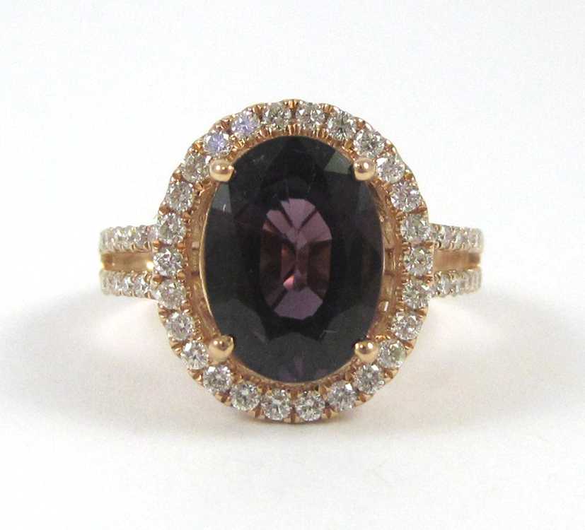 Appraisal: PURPLE SPINEL DIAMOND AND ROSE GOLD RING The k rose