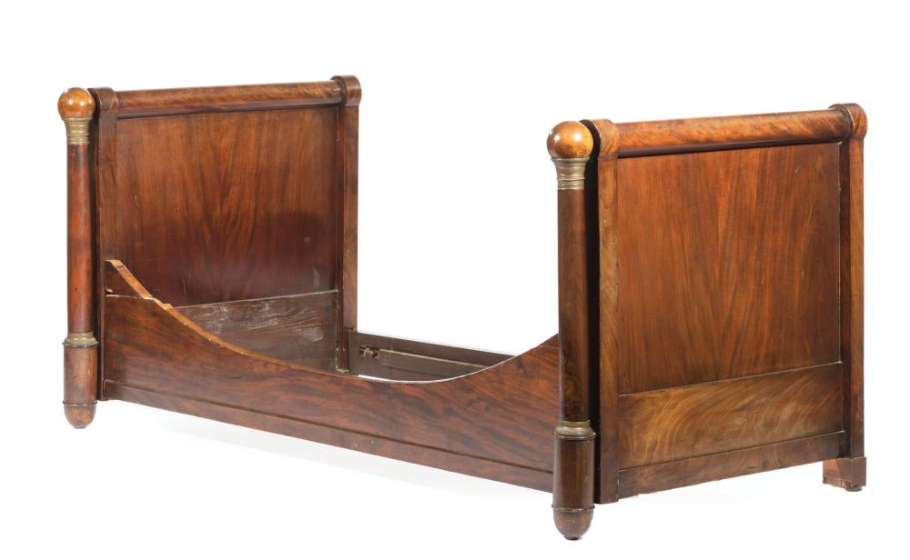 Appraisal: Restauration Bronze-Mounted Mahogany Lit en Bateau tubular crest rails spherule