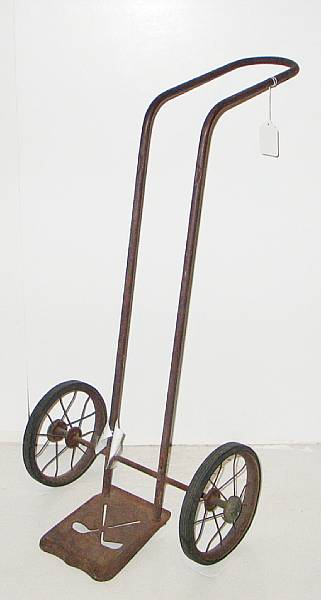 Appraisal: An early rusty Master Caddy stand up trolley without any