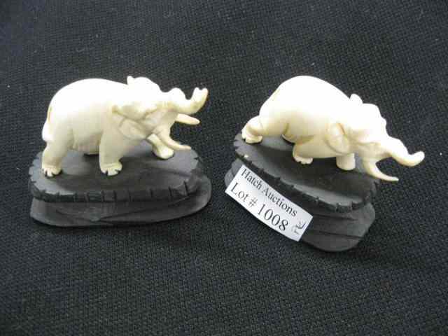 Appraisal: Pair of Chinese Carved Ivory Elephants each on wooden base