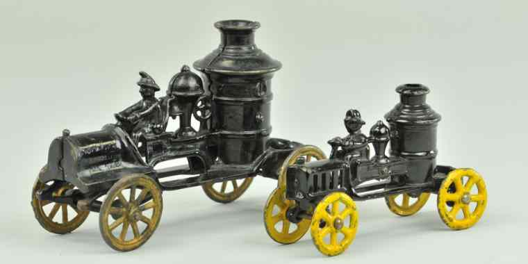 Appraisal: LOT OF TWO CAST IRON FIRE PUMPERS Cast iron both