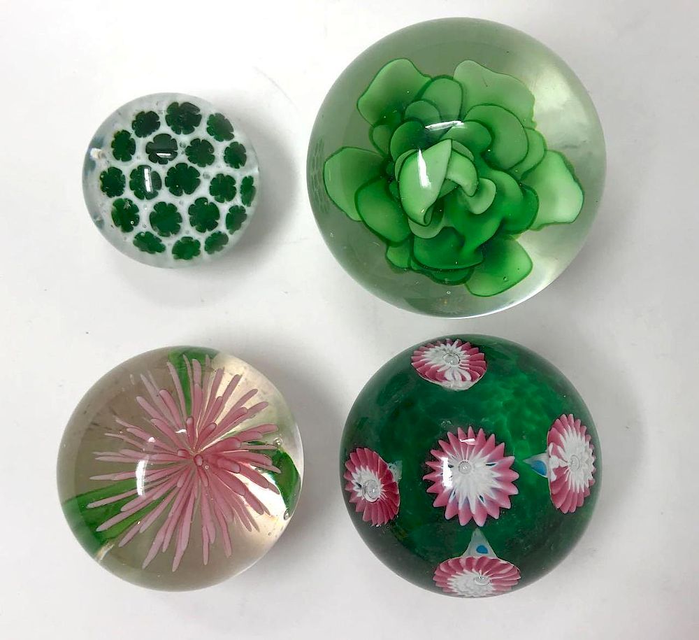 Appraisal: Four Floral Art Glass Paperweights Lot Four Floral Art Glass