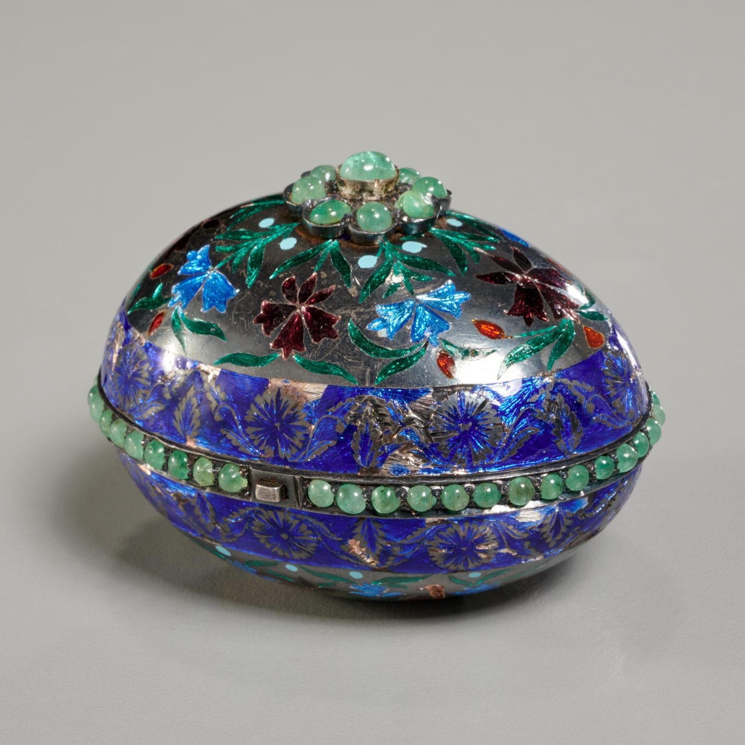 Appraisal: MUGHAL STYLE ENAMELED AND JEWELED EGG BOX Likely th c