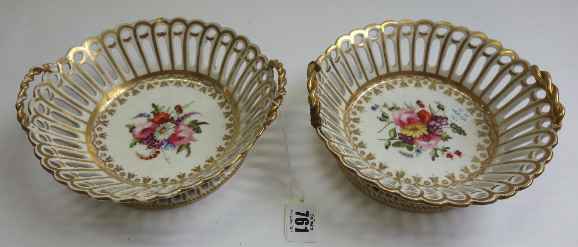 Appraisal: A pair of Coalport porcelain circular pierced two-handled baskets circa