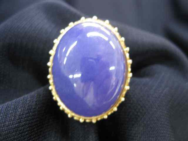 Appraisal: Lavendar Jade Ring large purple cabachon in k yellow gold