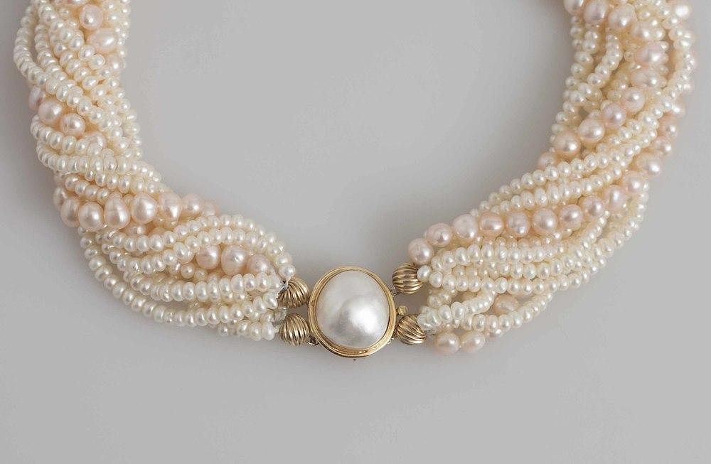 Appraisal: Freshwater Pearl Necklace Twelve strand freshwater pearl necklace having a