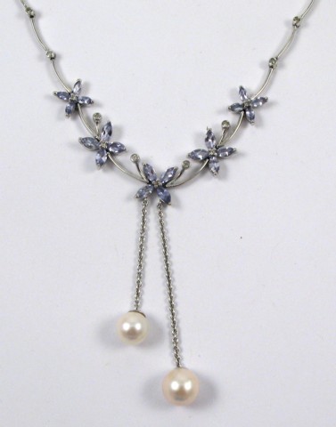 Appraisal: DIAMOND AND PEARL NECKLACE The k white gold necklaces is