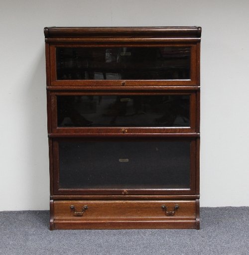 Appraisal: A Globe Wernicke three-part bookcase cm wide