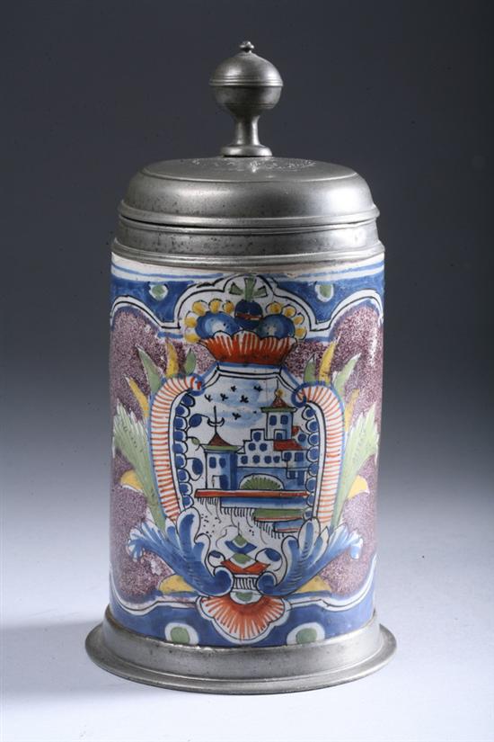 Appraisal: GERMAN PEWTER-MOUNTED FAYENCE TANKARD Circa Polychrome decorated one side with