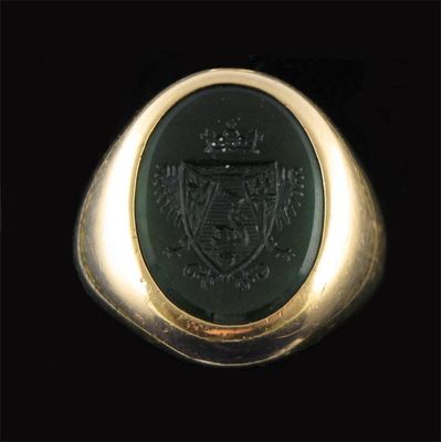 Appraisal: A carved tourmaline signet ring the oval shaped tourmaline carved