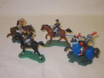 Appraisal: Four Herald Swoppit Models comprising Mounted Union Trooper mounted Union