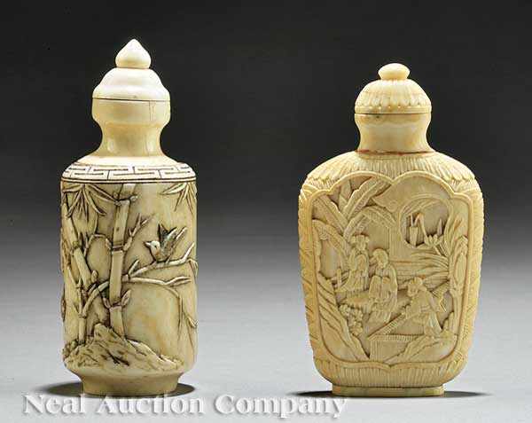 Appraisal: Two Chinese Carved Ivory Snuff Bottles the first cylinder form