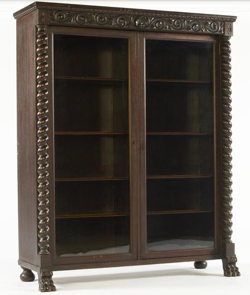 Appraisal: VICTORIAN Empire style mahogany bookcase with barley twist columns and