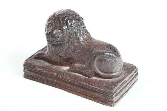 Appraisal: SEWERTILE LION Ohio st half- th century Molded lion on