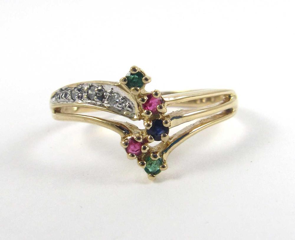 Appraisal: RUBY SAPPHIRE EMERALD AND FOURTEEN KARAT GOLD RING The k