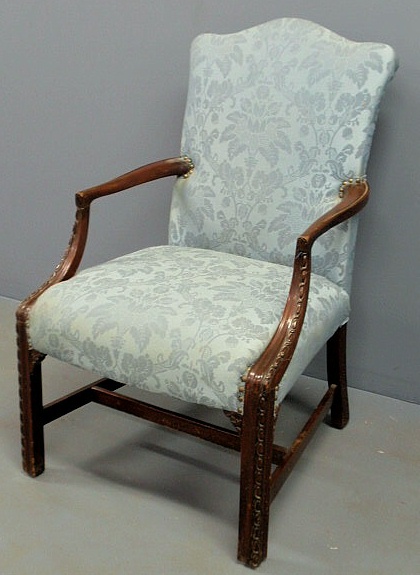 Appraisal: Chippendale style mahogany lolling chair with blue upholstery h x