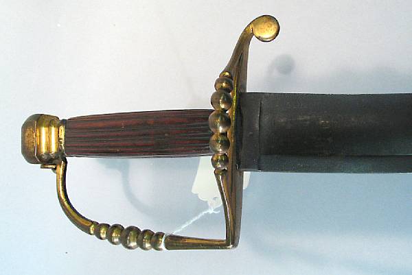 Appraisal: An English sabercirca Curved inch blade with broad shallow fuller