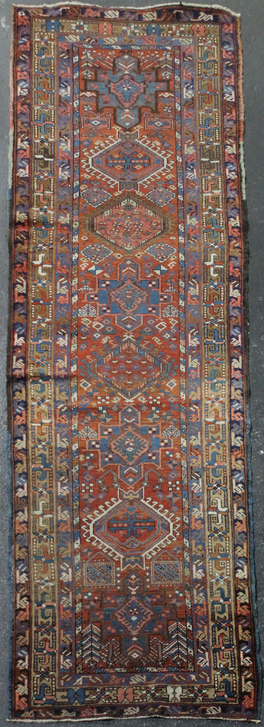 Appraisal: CAUCASIAN TRIBAL RUNNER turkish knots with goat or camel's hair