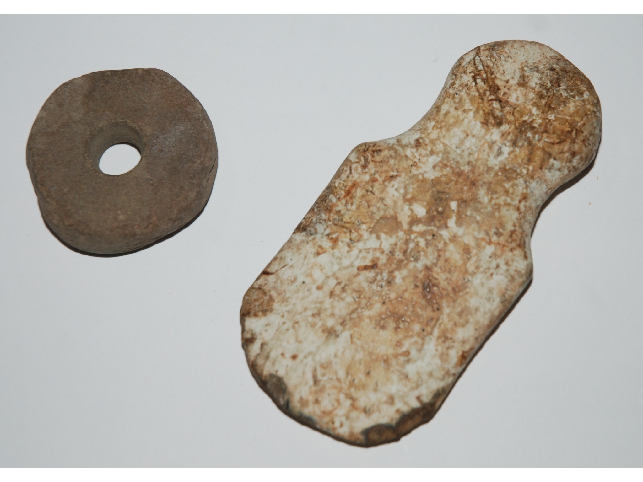 Appraisal: A Neolithic stone axe head cm long excavated in Hoy