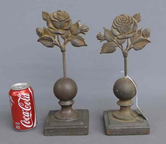 Appraisal: Pair cast iron flower decorations '' Ht