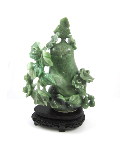 Appraisal: CHINESE CARVED JADE URN on hardwood plinth The lidded double