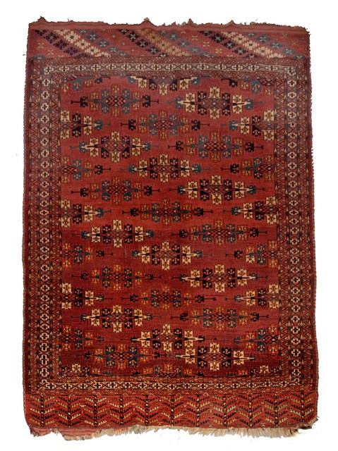 Appraisal: A TH CENTURY YOMUT BRICK GROUND MAIN CARPET with rows