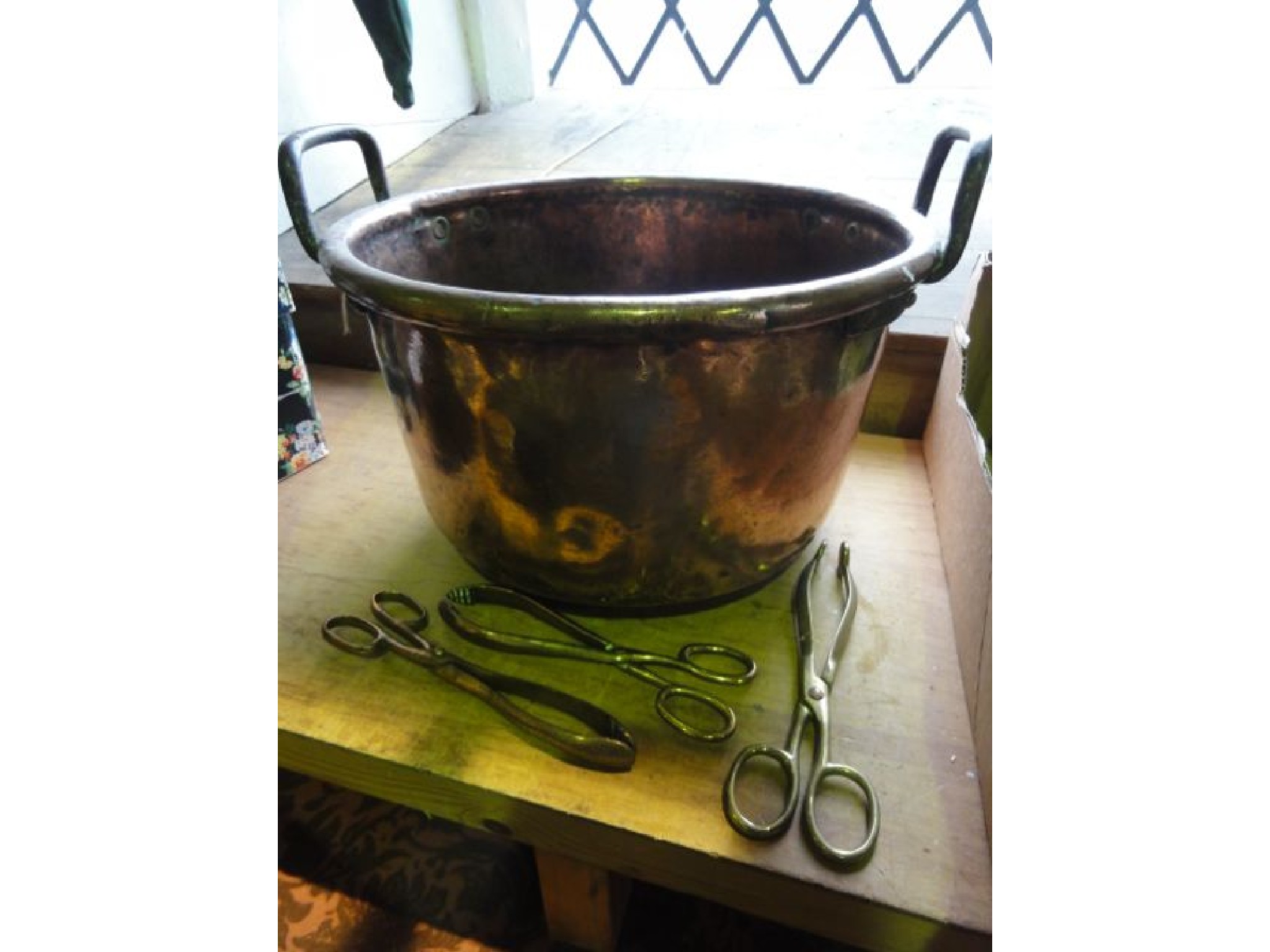 Appraisal: A substantial th century copper boiling pan with riveted iron