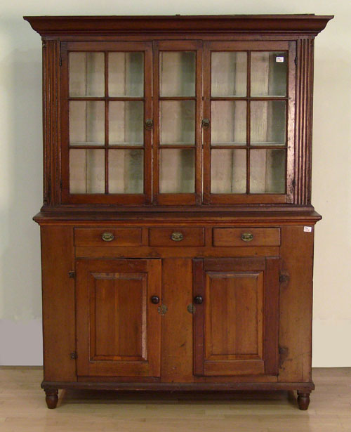 Appraisal: Pennsylvania two-part pine Dutch cupboard early th c h x