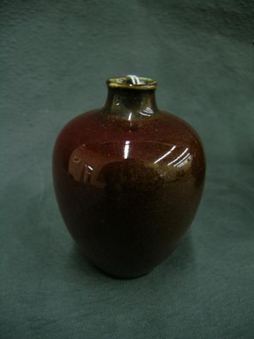 Appraisal: Rookwood Vase dated brown and red salt glaze partial pattern