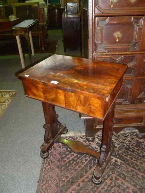 Appraisal: A VICTORIAN ROSEWOOD OCCASIONAL TABLE of rectangular form on square