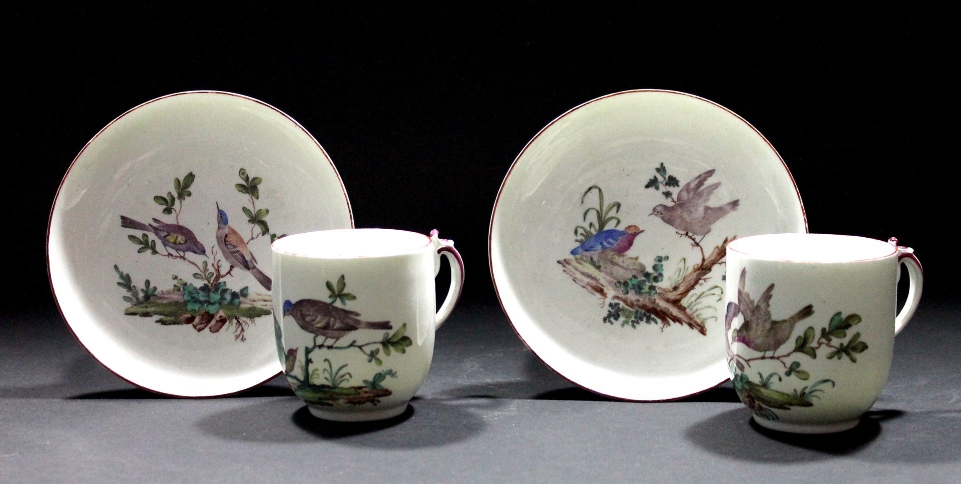 Appraisal: A good pair of Tournai coffee cups and saucers circa