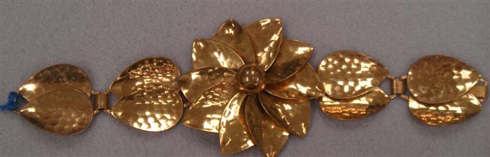 Appraisal: Flower bracelet of hammered copper Estimate -