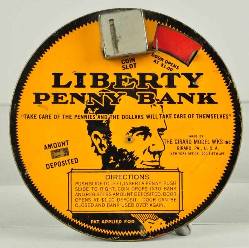 Appraisal: Tin Liberty Penny Registering Bank Description Nice image of Abe