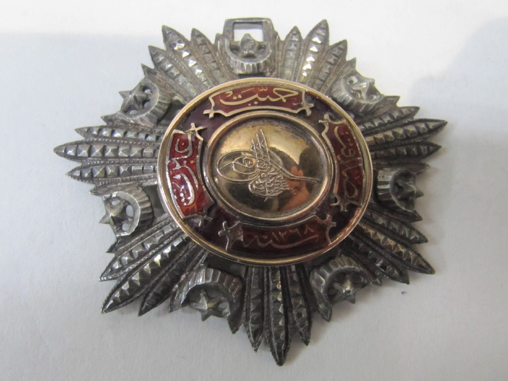 Appraisal: Turkish white metal and enamel badge