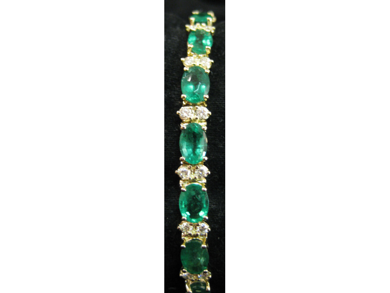 Appraisal: EMERALD AND DIAMOND BRACELET k yellow gold bracelet set with