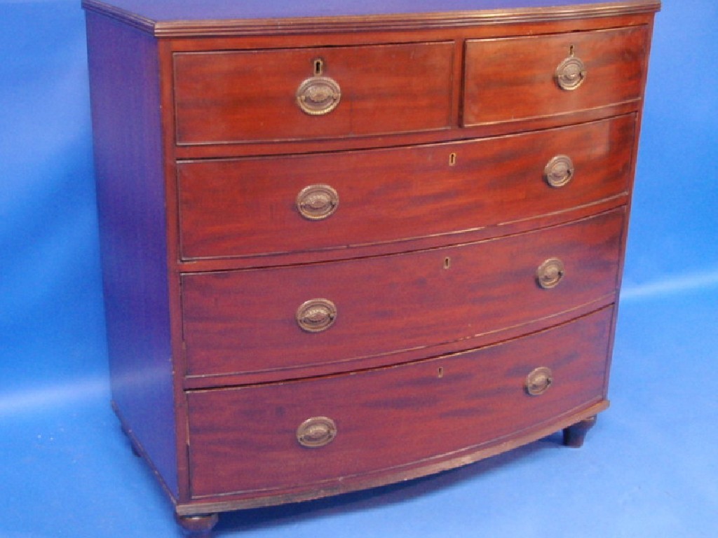 Appraisal: A Victorian mahogany bow front chest of two short and