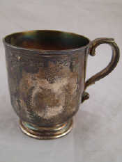 Appraisal: A Victorian silver Christening mug unwritten by DH CH London