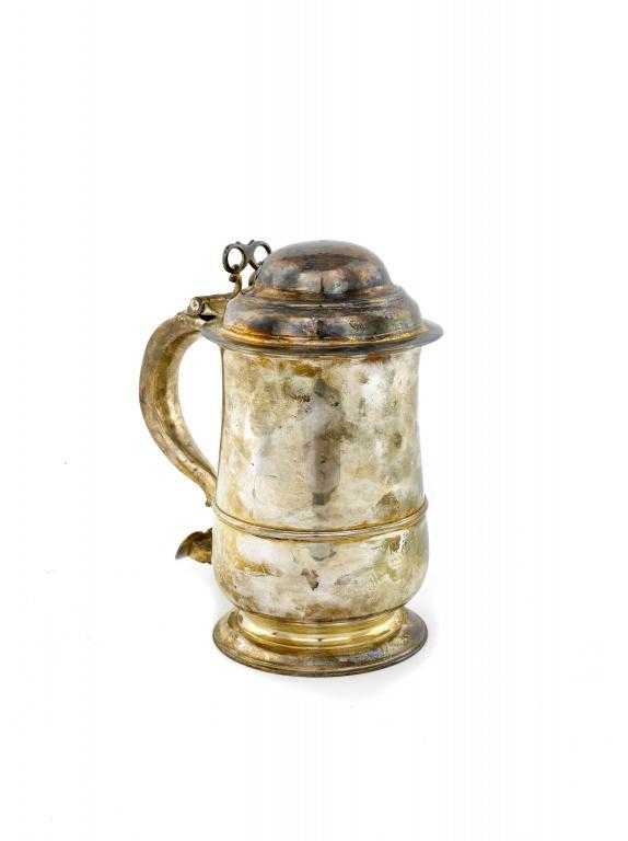 Appraisal: A GEORGE II TANKARD of baluster form the domed lid