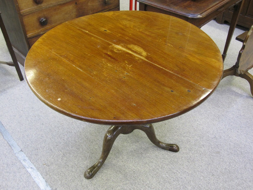 Appraisal: Mahogany circular occasional table upon triform base