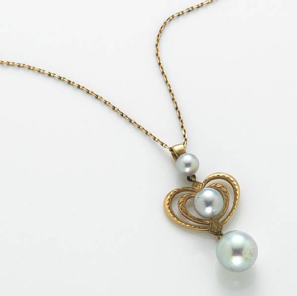 Appraisal: A blue cultured pearl and k gold heart motif pendant