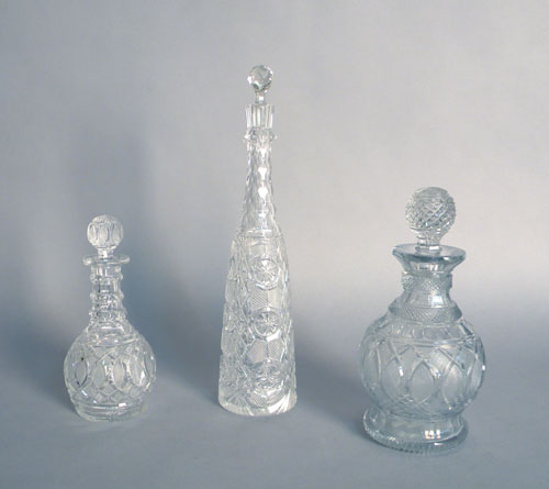 Appraisal: Three colorless glass decanters ca h h h