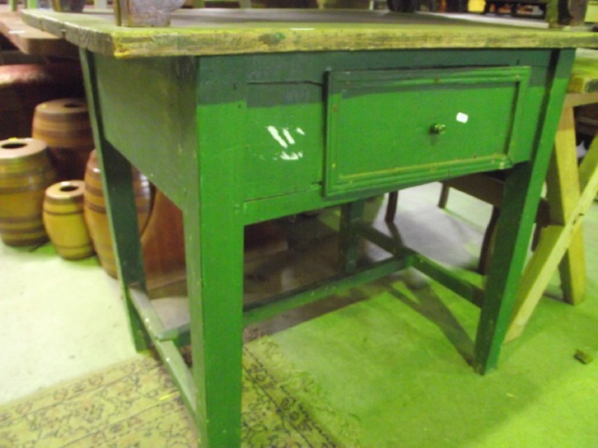 Appraisal: A rustic scrub top pine kitchen table the rectangular top