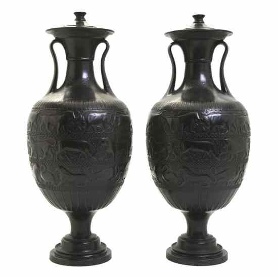 Appraisal: A Pair of Neoclassical Style Bronze Urns each of handled