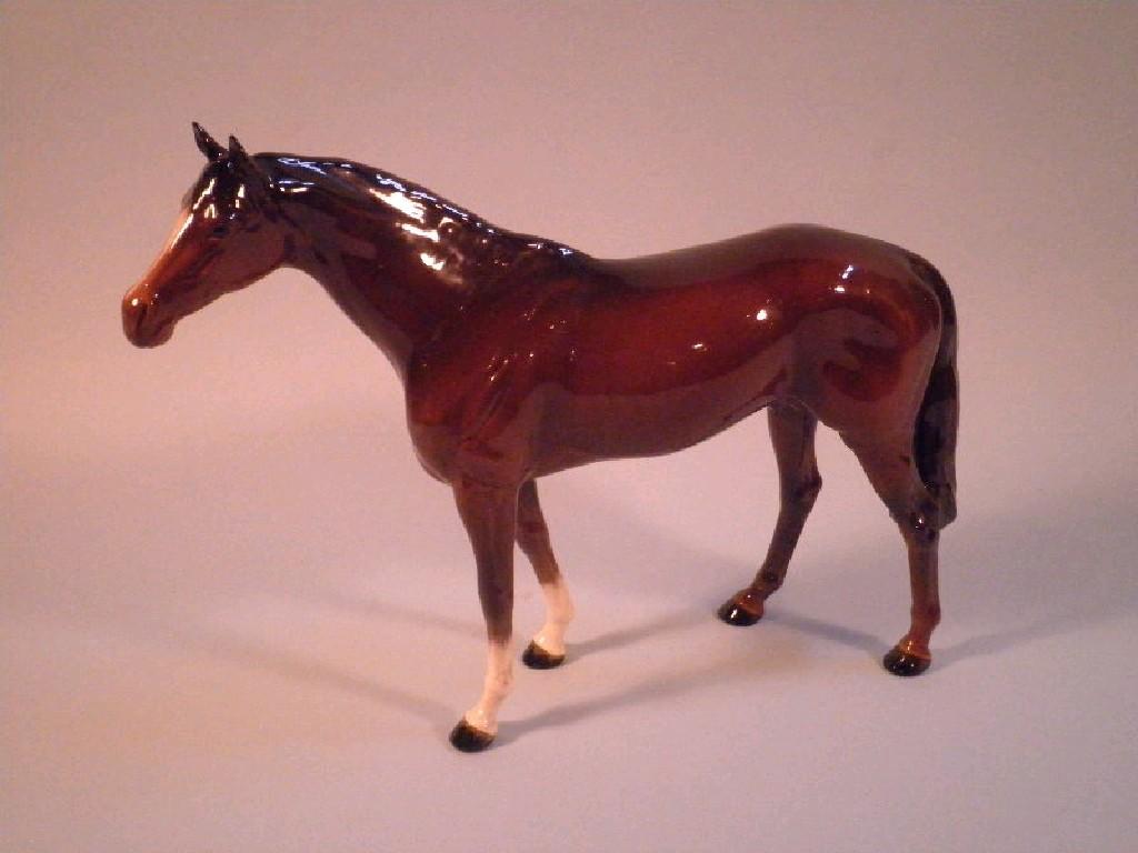 Appraisal: A large brown Beswick horse approximately cm wide