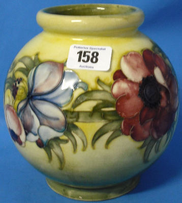 Appraisal: A Moorcroft Globular Vase decorated with Anemone on Yellow Ground