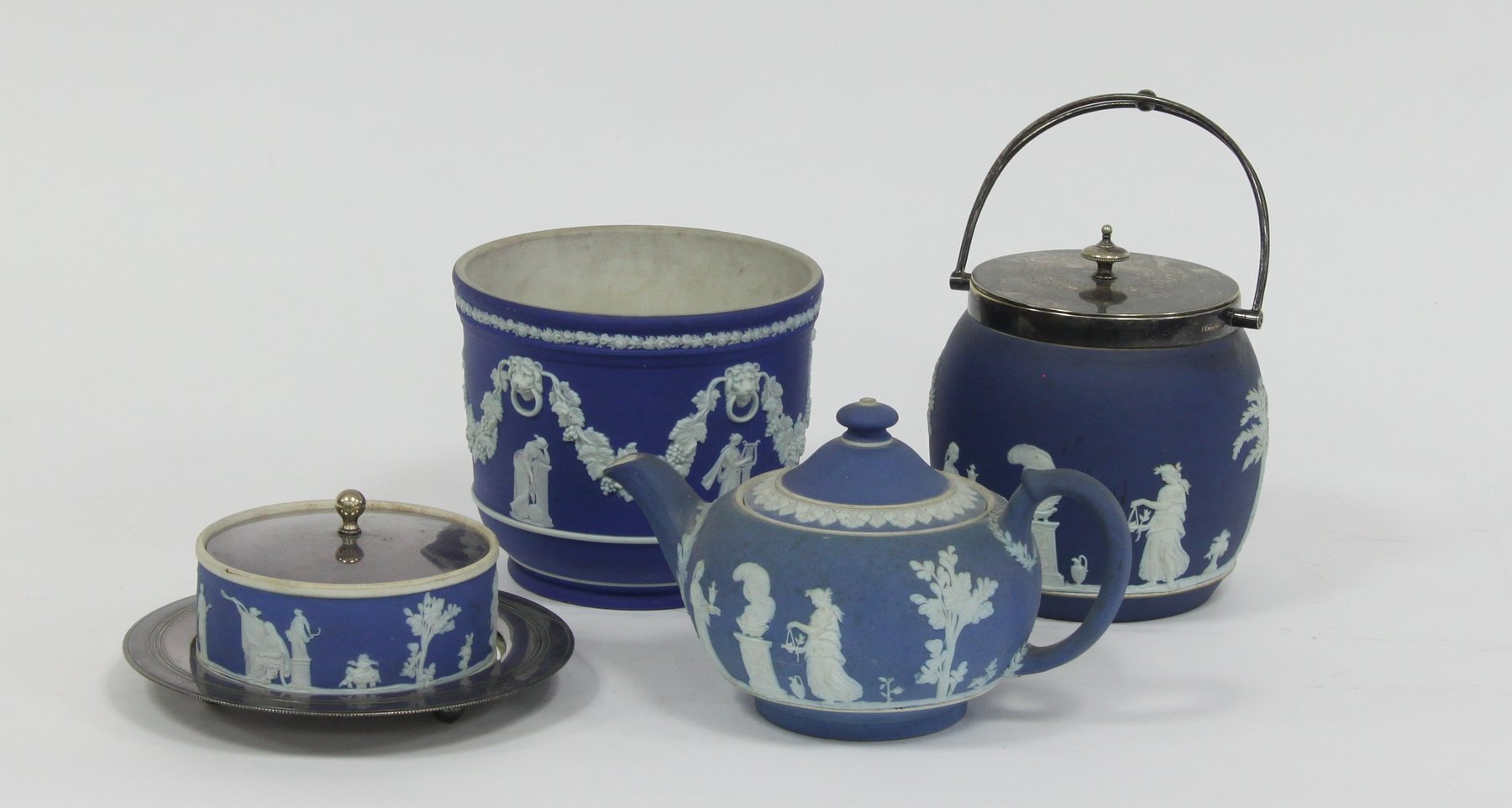 Appraisal: A Wedgwood blue jasperware jardiniere cm high a teapot and