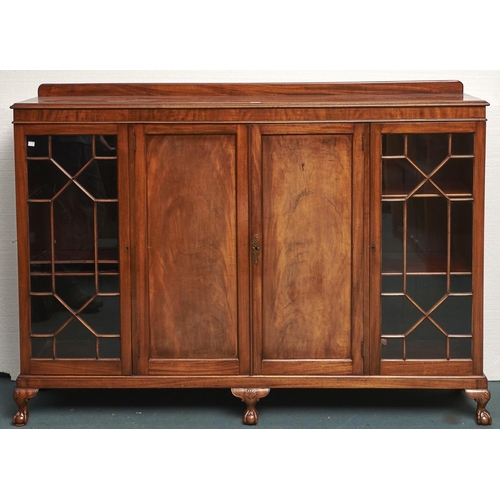 Appraisal: A mahogany side cabinet c the central panel door flanked